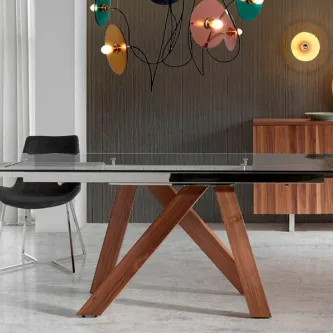Não há limites para a elegância da sua sala de estar. Esta mesa extensível de vidro cristal é a solução perfeita para qualquer ambiente.
