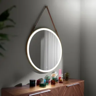 O espelho redondo Atrani faz qualquer cômodo ou espaço mais sofisticado e moderno com seu design minimalista e elegante.